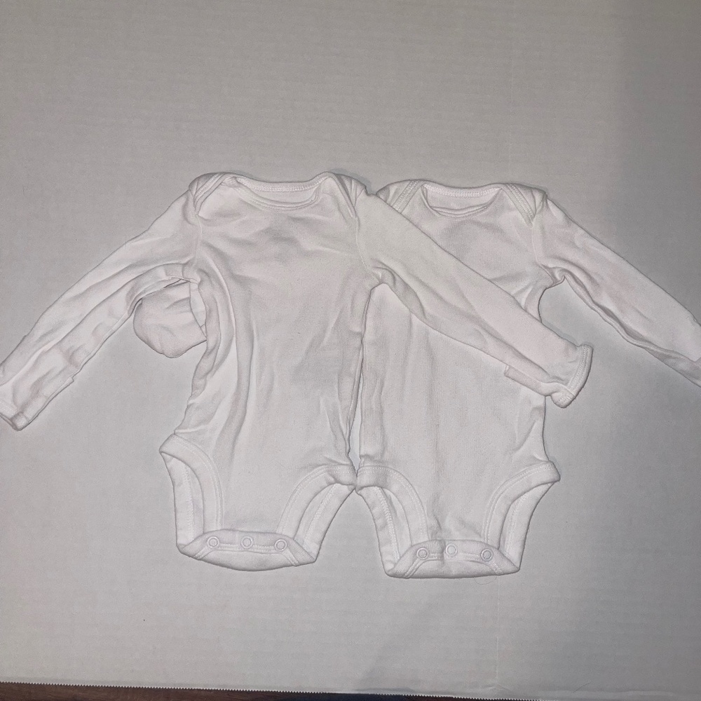 Carter’s - two pack newborn white onesies